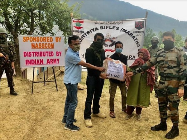 Major Pradeep Arya distributing the essential kit at Kupwara