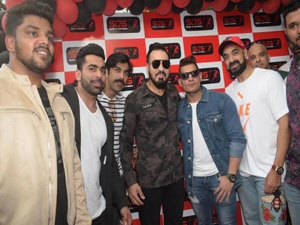 Junaid Kaliwala with Shera and friends at SOS store launch