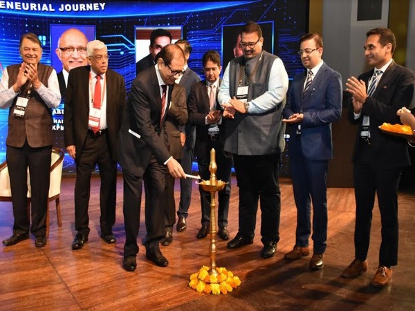 Atul Nishar lighting the lamp during the inauguration of TiEcon Mumbai 2020 as Deepak Parekh and the TiE Mumbai board look on.