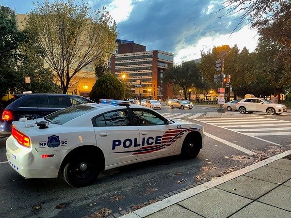 Businesses in downtown Washington, D.C., boarded up their storefront windows starting Friday evening