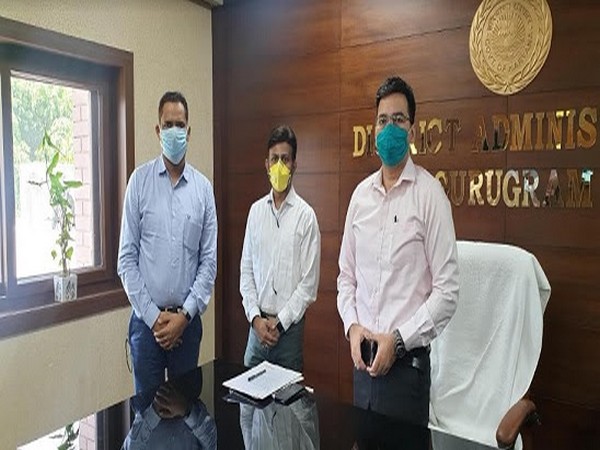 Ajay Ambewadikar and Vikas Kikan of CNH with A K Khatri, DC Gurugram