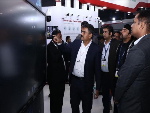 Ashish P. Dhakan, MD & CEO, Prama Hikvision India showing the Hikvision's newly launched product Interactive Screen to the delegates at IFSEC India 2019
