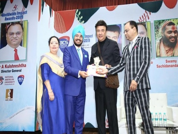 From Right to LeAnu Malik - Music Director and Singer presenting Explanatory Journalism Award to Dr HS Paul - Delhi Bureau Chief, and Sharan Kaur - Chief Manager (Delhi Office), Daily Excelsior