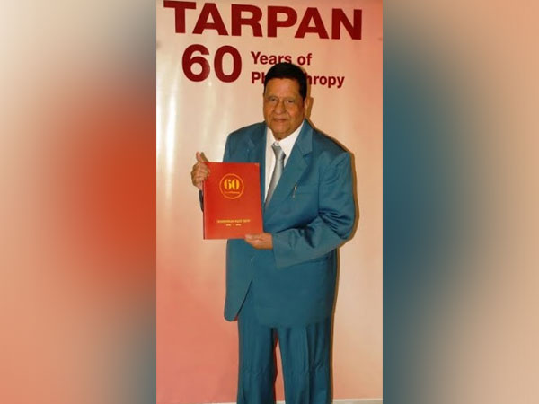 Mahavirprasad Saraf releasing 'TARPAN 60' - citing various activities of the Trust