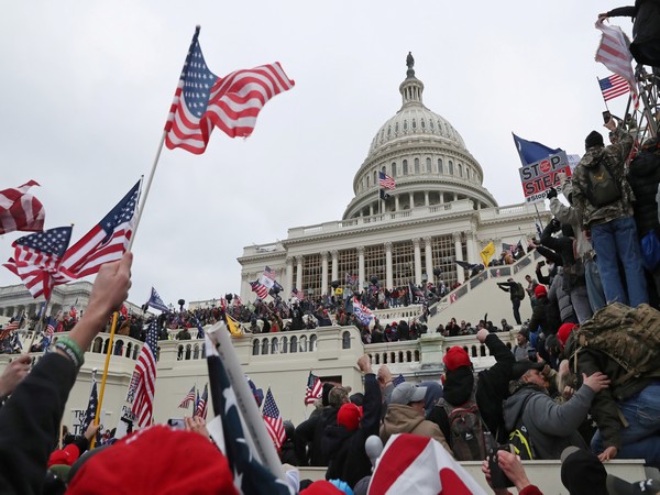 Group of Donald Trump's loyalists had breached the US Capitol, clashing with police, damaging property, seizing the inauguration stage and occupying the rotunda. (Photo credit: Reuters)