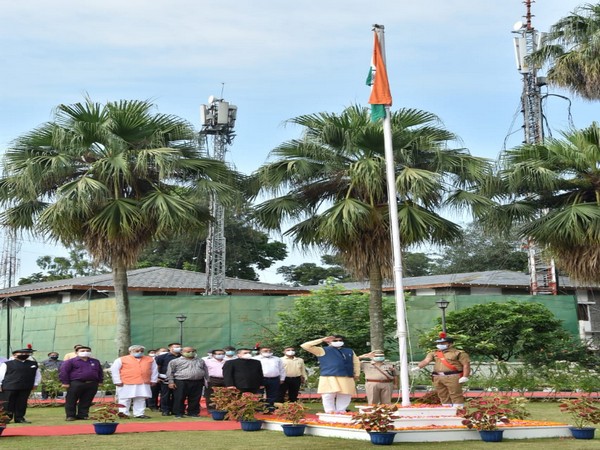Uttarakhand Chief Minister Trivendra Singh Rawat hoisted the national flag at his residence on Saturday. (Photo/ANI)