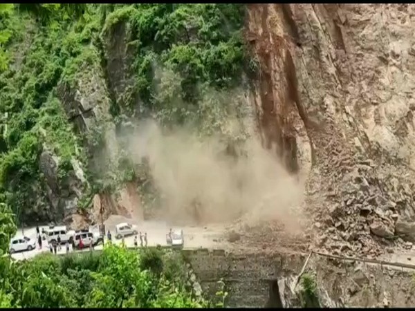 Badrinath National Highway 07 was blocked after section of the hill near fell in Chamoli district. (Photo/ANI)