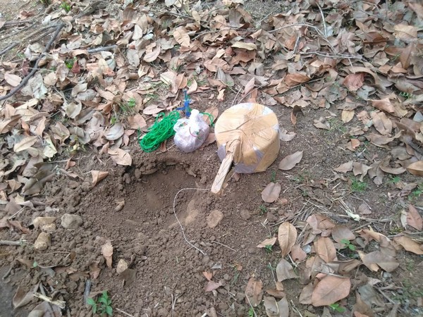 Picture of the unearthed pressure cooker IED. (ANI)