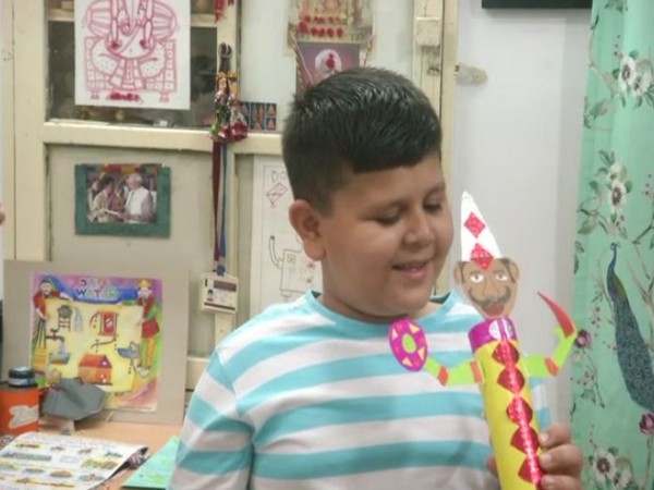 Gautam Suthar with one of his art-work (Photo/ANI)