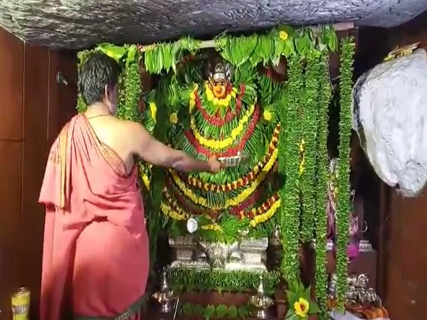 Priest offering prayers in Vana Durga temple on Friday. (Photo/ANI)
