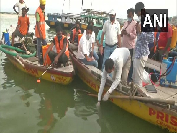 Team of Namami Gange' project conducting cleaning drive of river Ganga in Varanasi. (Photo/ANI)