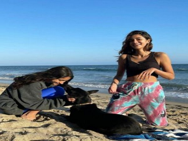 Ananya Panday with her sister Rysa Panday and pet dog