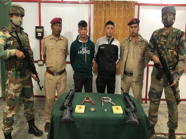 Arms and ammunition recovered across Indo-Myanmar Border along with apprehended individuals. (ANI/photo) 