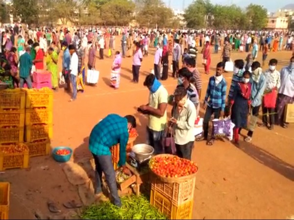 Market officials have put markers every three feet to ensure social distancing. Photo/ANI