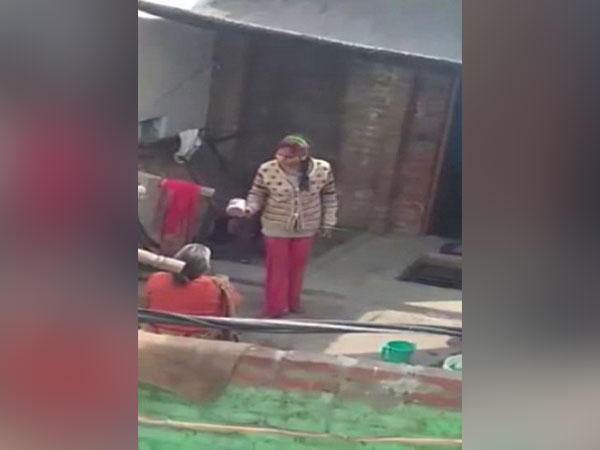 A grab of the video where the woman from Etah is shouring on her mother in-law [Photo/ANI]