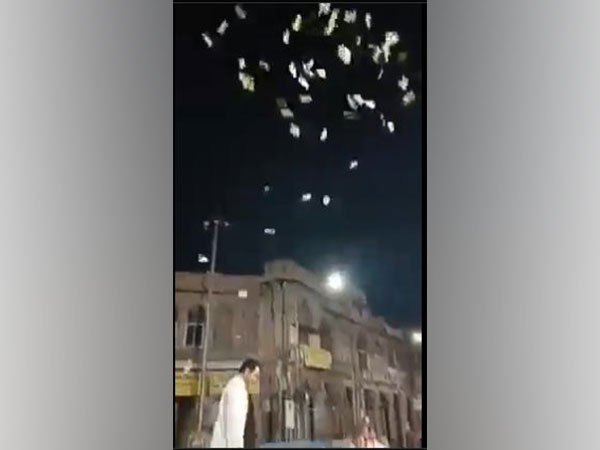 Hyderabad man tossing currency notes in air goes viral