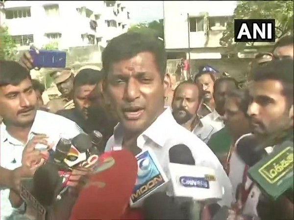 Vishal Krishna, General Secretary of Nadigar Sangam talking to media persons in Mylapore during polling.