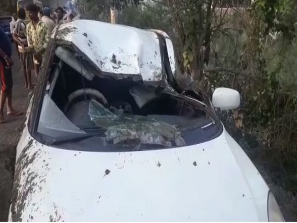 An image of the damaged car which fell into the canal in Poduru Mandal of West Godavari district [Photo/ANI]
