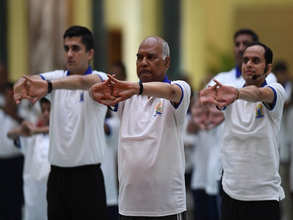 President Kovind performs yoga at the Rashtrapati Bhawan on International Yoga Day.