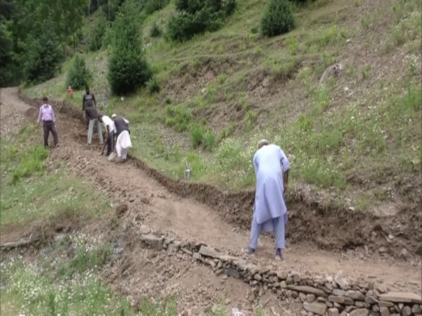 Local workers involved in construction work in Uri and Boniyar blocks in Jammu and Kashmir. (Photo/ANI)