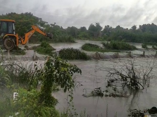 Visuals of an overflowing lake from Krishna District, Andhra Pradesh. [Photo/ANI]