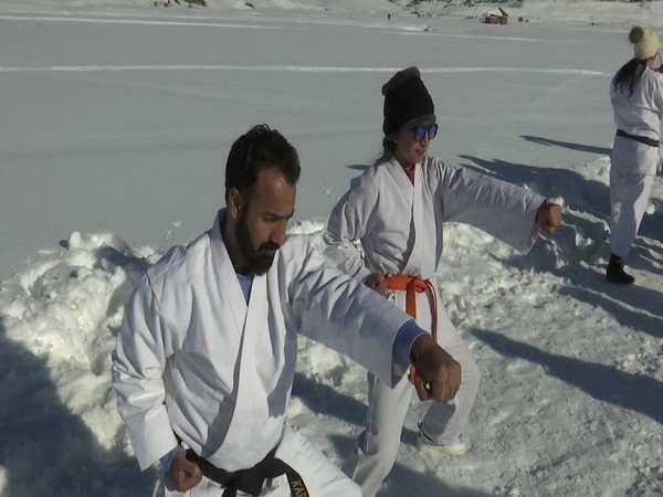 Karate players practicing in J-K's  Gulmarg during winter camp. (Photo/ANI)
