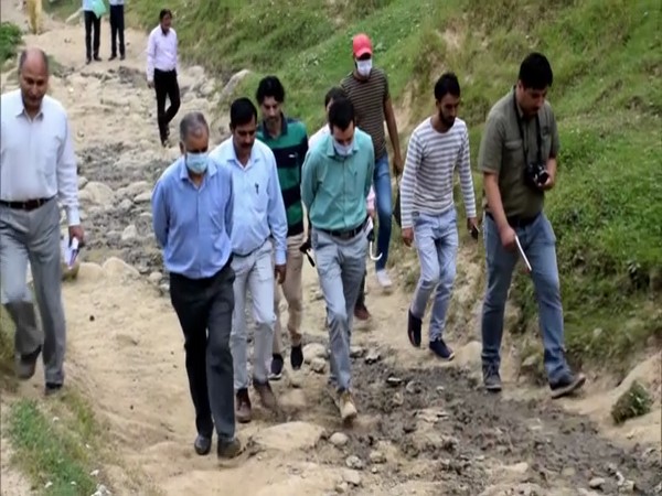 A team from the department of archives, archaeology and museum, Srinagar visiting the site (Photo/ ANI)
