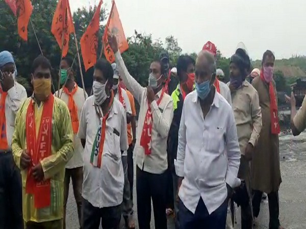 Singareni Collieries Company Limited mine workers protest on the last day of the 3-day strike against privatisation. (Photo/ANI)