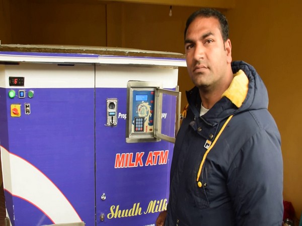 Entrepreneur Shabir Ahmad Wagay in front of Pulwama's 