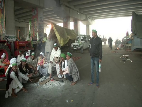 Farmers protesting at Gazipur border (Photo/ANI)