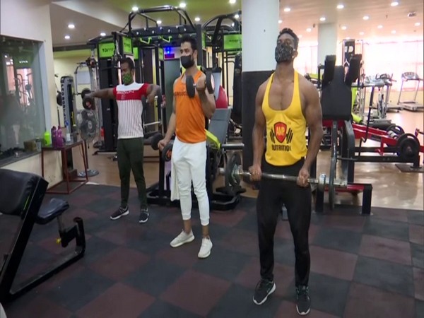 Members working out at a gym in Bhubaneswar. (Photo/ANI)
