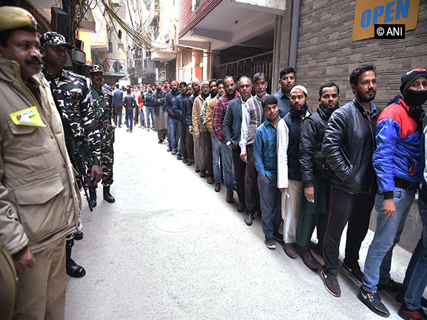Voters in queue to cast their votes in Delhi on Saturday.
