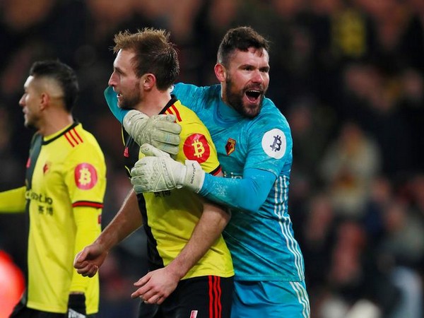 Watford's Ben Foster celebrates after the match with Craig Dawson.