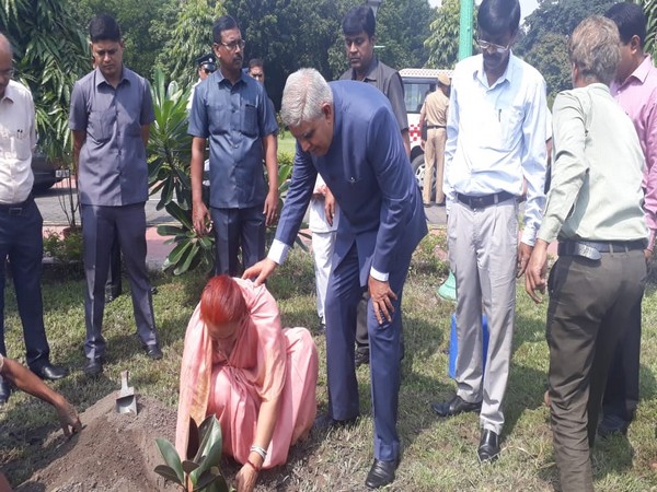 West Bengal Governor Jagdeep Dhankhar along with the First Lady during the planting of saplings in his garden on Wednesday. Photo/ANI