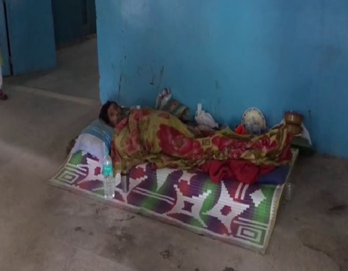 A patient lying on the floor at the North Bengal Medical College and Hospital on Wednesday in West Bengal. Photo/ANI
