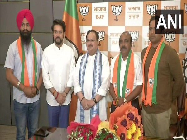 AAP Himachal president Anup Kesari, 2 others join BJP. (Photo/ANI)