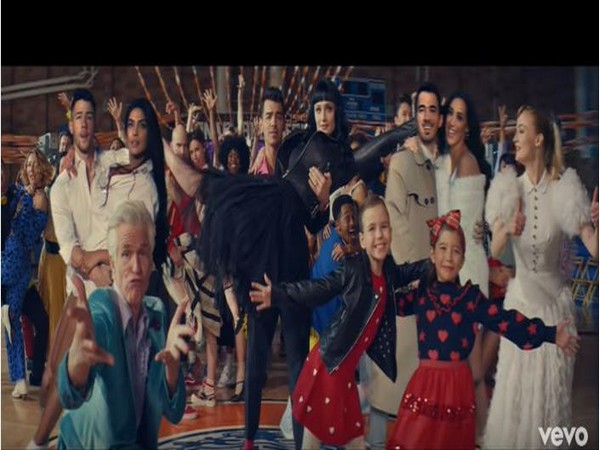 A still from the official music video of 'What A Man Gotta Do',