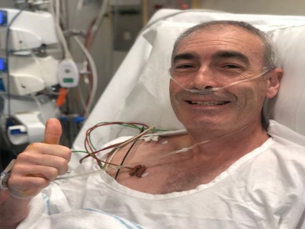 The caption was also accompanied by a picture of Greg on the hospital bed, smiling and giving thumbs up to the camera (Picture Courtesy: Twitter)