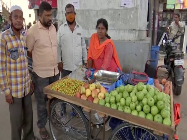 Rama Devi, a differently-abled woman, has changed her life from begging on roads for two years to set up her own fruits trolley. [Photo/ANI]