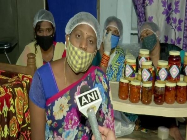 Jasmine, president of the Trans Equality Society with the other trans women in the community and their home-made pickles. (Photo/ANI)
