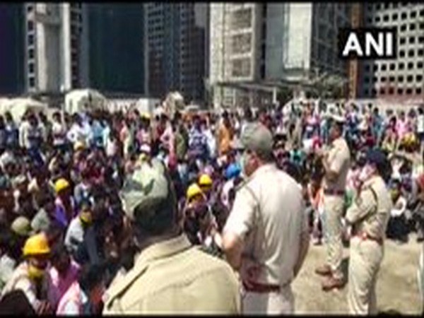 Workers protest at the office of Diamond Bourse on Tuesday. Photo/ANI