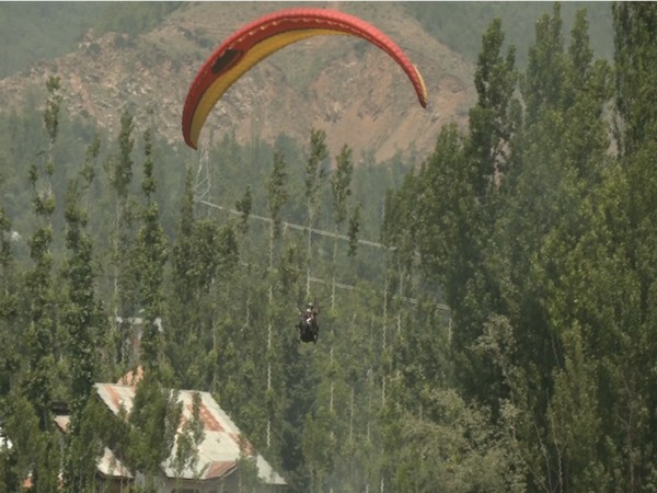 Visuals of tourists paragliding in Srinagar (Photo/ANI)
