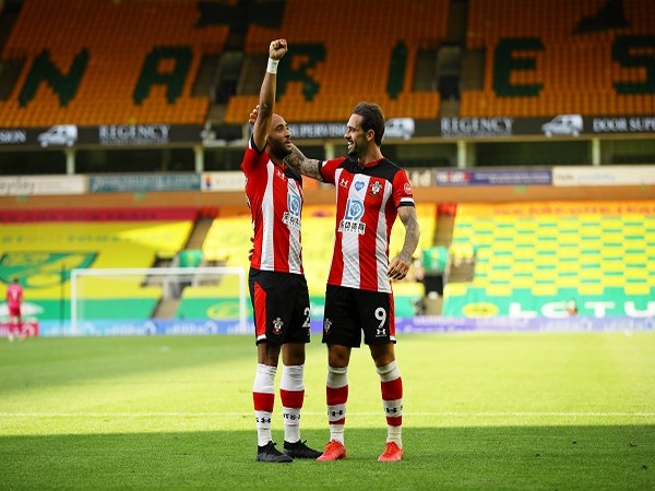 Nathan Redmond celebrates scoring their third goal with Danny Ings