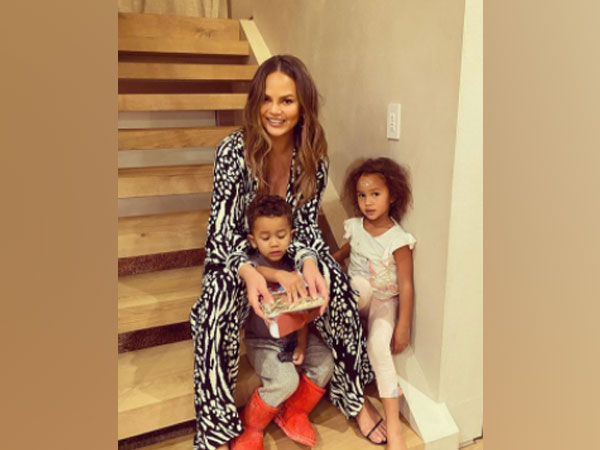 Chrissy Tiegen with her children (Image Source: Instagram)