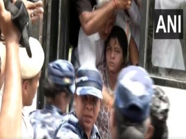 Mahila Congress President Netta D'Souza spat at police personnel (Screengrab of the viral video)