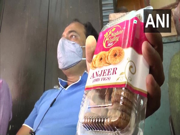 Visual of a local shopkeeper at the Kanpur market (Photo/ANI)