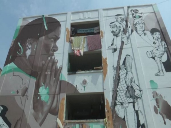 A mural depicting lives of various people on the wall of a building in Kannagi Nagar (Photo/ANI)