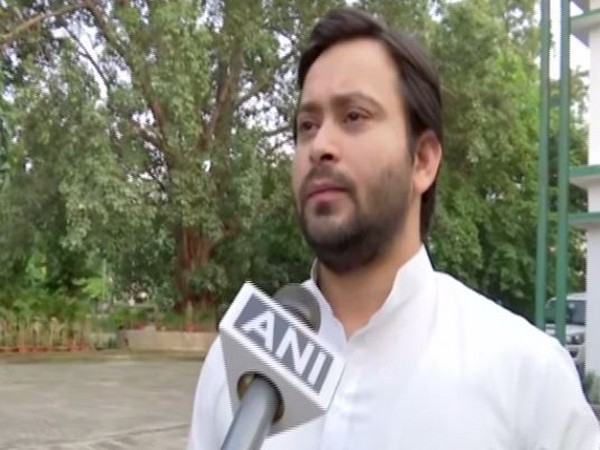 RJD leader Tejashwi Yadav talking to ANI in Patna on Sunday.