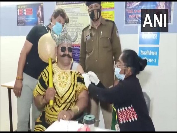 Police Constable Jawahar Singh gets himself vaccinated dressed up as 'Yamraj' to spread the message among the frontline workers to take the COVID-19 vaccine. (Photo/ ANI)