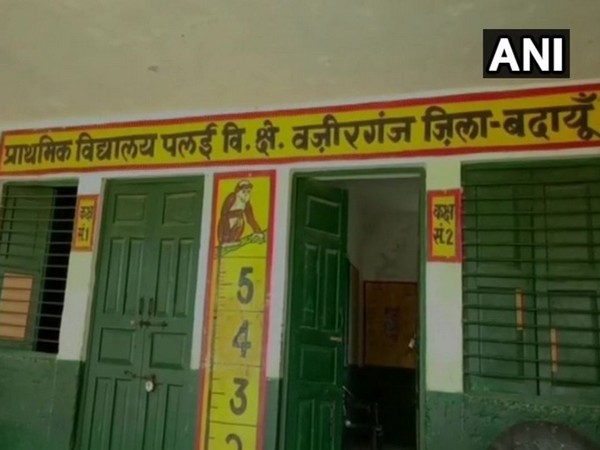 Palai village residents caught principal of this primary school when he was allegedly consuming alcohol in UP's Badaun. Photo/ANI